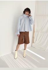 Tailored Faux Leather Bermuda Shorts with Seam Detailing and Mid-Length Cut