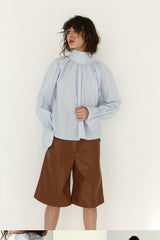 Tailored Faux Leather Bermuda Shorts with Seam Detailing and Mid-Length Cut