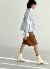 Tailored Faux Leather Bermuda Shorts with Seam Detailing and Mid-Length Cut