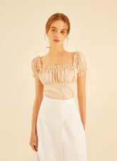 Smocked Linen Puff Sleeve Top With Square Neckline And Ruffle Details For Feminine Elegance