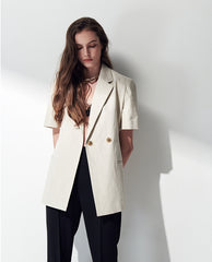 High-Waisted Linen Pants with Tailored Seams and Flared Legs for Summer Styling