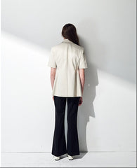 High-Waisted Linen Pants with Tailored Seams and Flared Legs for Summer Styling