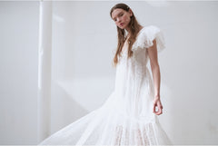 Elegant Full-Length Lace Dress With Delicate Floral Texture And Soft Sheer Overlay