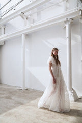 Elegant Full-Length Lace Dress With Delicate Floral Texture And Soft Sheer Overlay