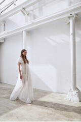 Elegant Full-Length Lace Dress With Delicate Floral Texture And Soft Sheer Overlay