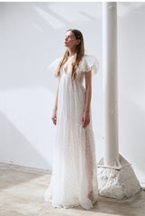 Elegant Full-Length Lace Dress With Delicate Floral Texture And Soft Sheer Overlay