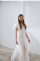 Elegant Full-Length Lace Dress With Delicate Floral Texture And Soft Sheer Overlay