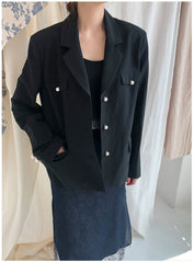 Tailored Double-Breasted Linen Blazer With Pearl Button Accents And Structured Silhouette