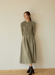 Elegant Smocked Long Sleeve Linen Midi Dress with Pleated Bodice and Flowing Skirt
