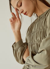 Elegant Smocked Long Sleeve Linen Midi Dress with Pleated Bodice and Flowing Skirt