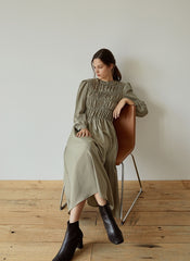 Elegant Smocked Long Sleeve Linen Midi Dress with Pleated Bodice and Flowing Skirt