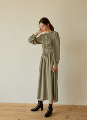 Elegant Smocked Long Sleeve Linen Midi Dress with Pleated Bodice and Flowing Skirt