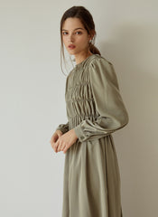 Elegant Smocked Long Sleeve Linen Midi Dress with Pleated Bodice and Flowing Skirt