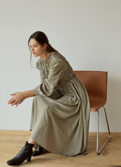 Elegant Smocked Long Sleeve Linen Midi Dress with Pleated Bodice and Flowing Skirt