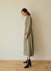 Elegant Smocked Long Sleeve Linen Midi Dress with Pleated Bodice and Flowing Skirt