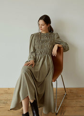 Elegant Smocked Long Sleeve Linen Midi Dress with Pleated Bodice and Flowing Skirt