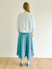 Women's Linen Pleated Midi Skirt with Asymmetrical Hem – Flowing A-Line Silhouette