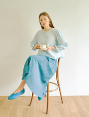 Women's Linen Pleated Midi Skirt with Asymmetrical Hem – Flowing A-Line Silhouette