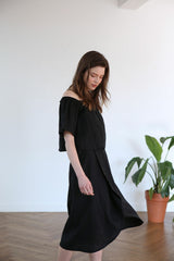 Asymmetric Midi Linen Skirt With Wrap Detail And Flowy Silhouette