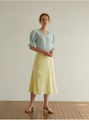 High-Waisted A-Line Midi Skirt in Breathable Pure Linen with Front Pleat and Button Detail