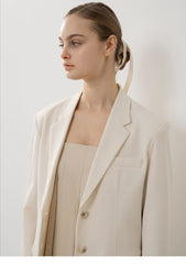Tailored Women's Longline Linen Blazer with Button Closure and Structured Lapel Design