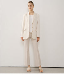 Tailored Women's Longline Linen Blazer with Button Closure and Structured Lapel Design