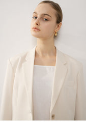 Tailored Women's Longline Linen Blazer with Button Closure and Structured Lapel Design