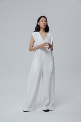Sleeveless Wide-Leg Linen Jumpsuit with Deep V-Neck and Folded Hems