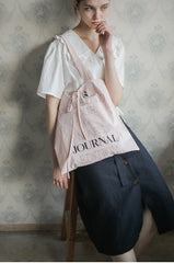 Women’s Linen Wrap Blouse with Ruffle Collar, Short Sleeves, and Side Tie Closure