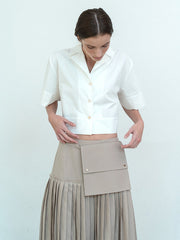 High-Waisted Pleated Linen Skirt with Structured Waistband and Modern Wrap Detail