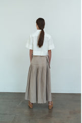 High-Waisted Pleated Linen Skirt with Structured Waistband and Modern Wrap Detail