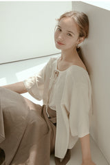 Relaxed Fit Linen Blouse with Back Tie Detail and Soft Drape Silhouette