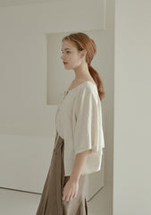 Relaxed Fit Linen Blouse with Back Tie Detail and Soft Drape Silhouette
