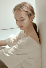 Relaxed Fit Linen Blouse with Back Tie Detail and Soft Drape Silhouette