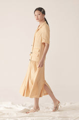 Tailored Double-Breasted Linen Dress with Notch Lapel and Pleated Drop-Waist Silhouette