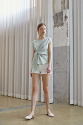 High-Rise Raw Hem Cotton Denim Shorts For Women With Relaxed Fit And Modern Silhouette