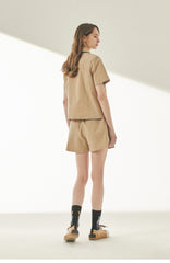 Short-Sleeve Double-Breasted Linen Blazer With Notched Lapels And Welt Pocket Detail