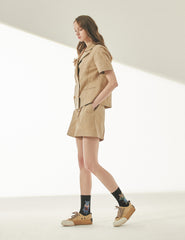 Short-Sleeve Double-Breasted Linen Blazer With Notched Lapels And Welt Pocket Detail