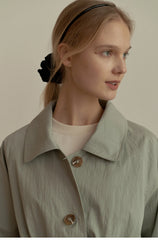 Crisp Cotton Button-Down Shirt with Waist Tie and Patch Pockets for a Tailored Feminine Fit