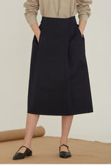High-Waisted Linen Midi Skirt With Structured Pleats And Side Pockets