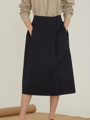 High-Waisted Linen Midi Skirt With Structured Pleats And Side Pockets
