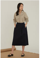 High-Waisted Linen Midi Skirt With Structured Pleats And Side Pockets