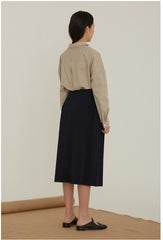 High-Waisted Linen Midi Skirt With Structured Pleats And Side Pockets