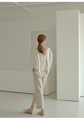 High-Waisted Wide-Leg Linen Pants with Rolled Cuffs and Tailored Seam Detailing