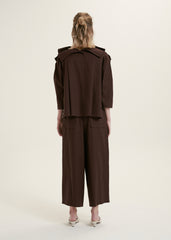 Elegant Ruffle-Collar Linen Blouse With Statement Buttons And Relaxed Tailored Silhouette