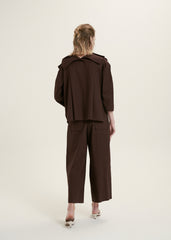 Elegant Ruffle-Collar Linen Blouse With Statement Buttons And Relaxed Tailored Silhouette