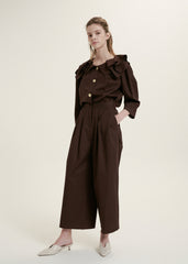 Elegant Ruffle-Collar Linen Blouse With Statement Buttons And Relaxed Tailored Silhouette