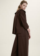 Elegant Ruffle-Collar Linen Blouse With Statement Buttons And Relaxed Tailored Silhouette
