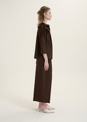 Elegant Ruffle-Collar Linen Blouse With Statement Buttons And Relaxed Tailored Silhouette