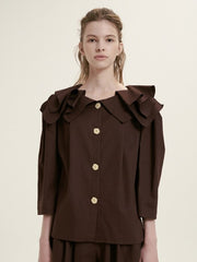 Elegant Ruffle-Collar Linen Blouse With Statement Buttons And Relaxed Tailored Silhouette